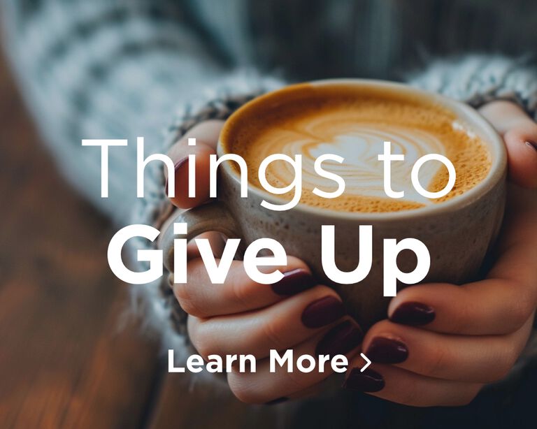 A person's hand holding a warm cup of coffee.  Image links to Things to Give Up page.